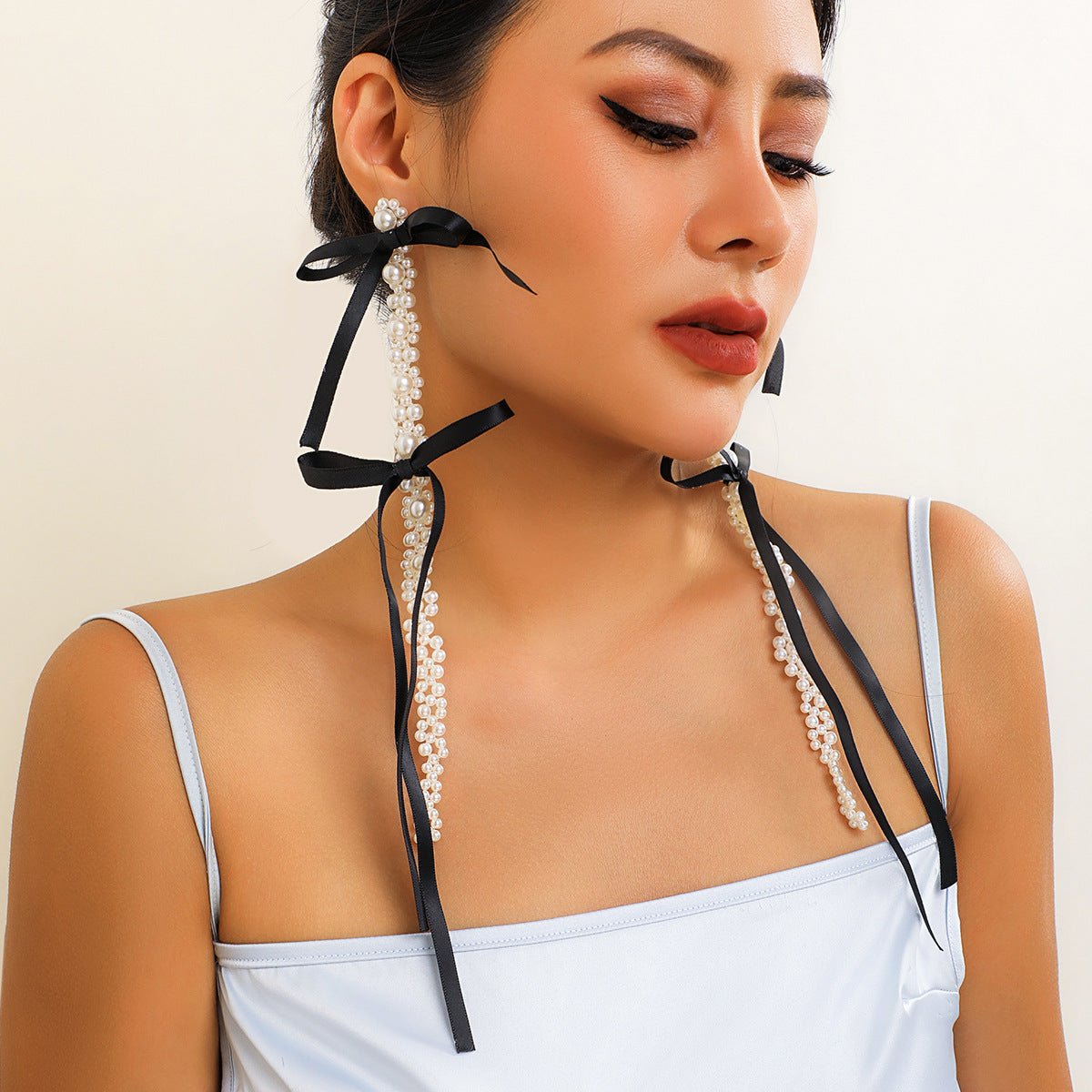 Exaggerated Fabric Tassel Bow Earrings with Pearl & Crystal Flower Studs - Alba Vaga