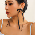 Exaggerated Fabric Tassel Bow Earrings with Pearl & Crystal Flower Studs - Alba Vaga