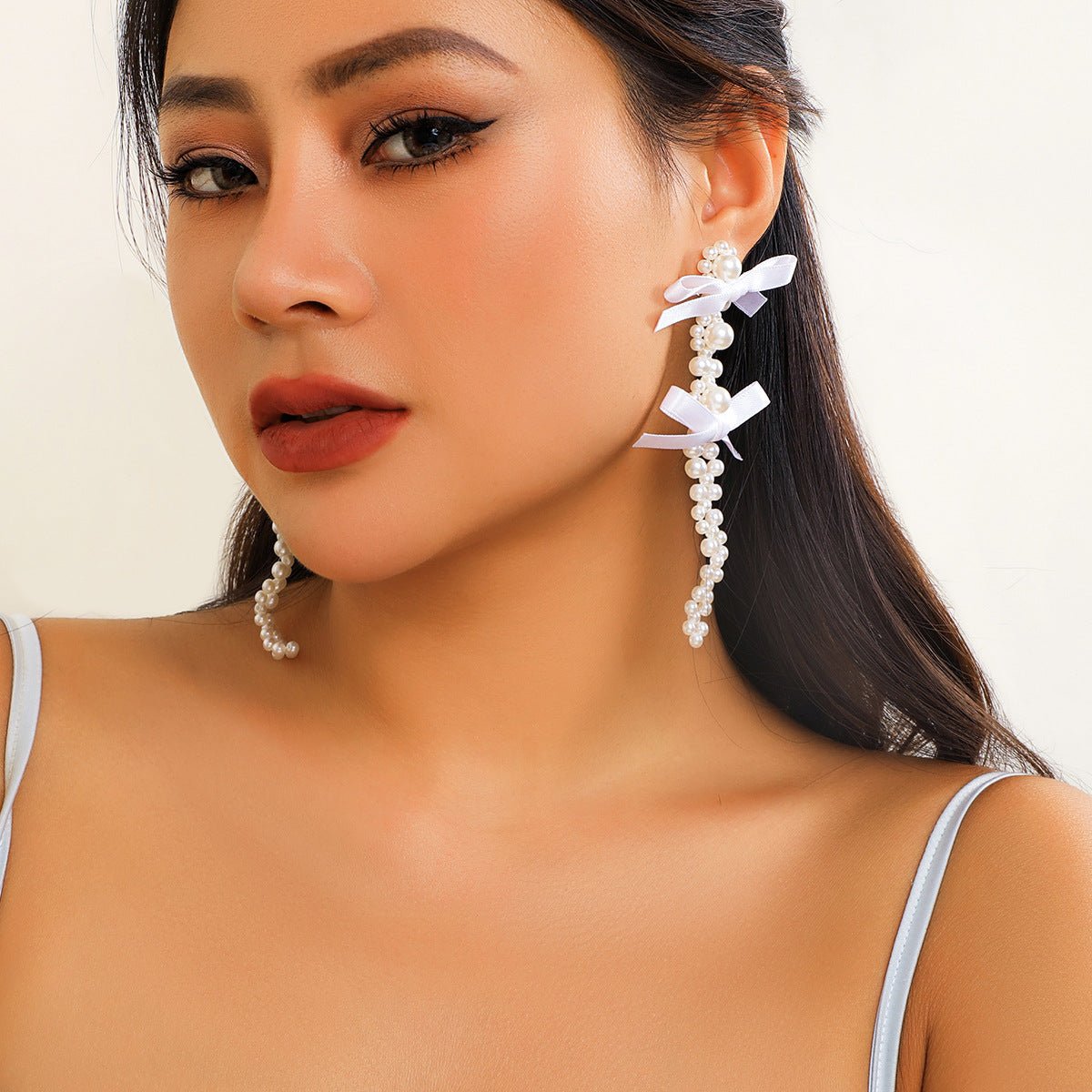 Exaggerated Fabric Tassel Bow Earrings with Pearl & Crystal Flower Studs - Alba Vaga