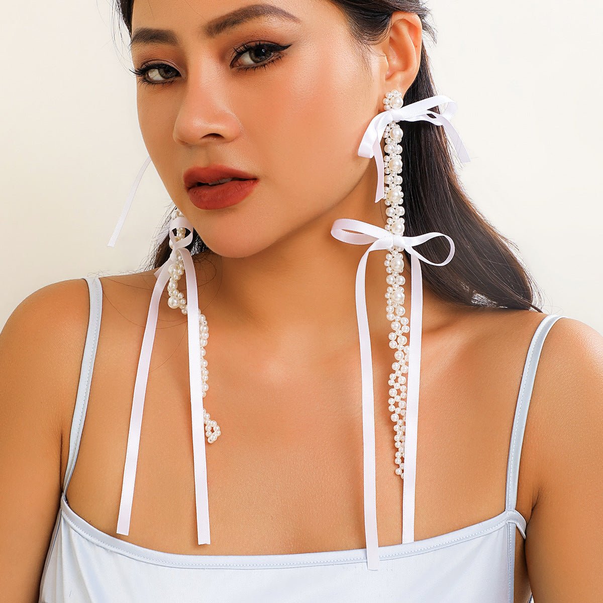 Exaggerated Fabric Tassel Bow Earrings with Pearl & Crystal Flower Studs - Alba Vaga