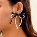 Exaggerated Fabric Tassel Bow Earrings with Pearl & Crystal Flower Studs - Alba Vaga