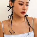 Exaggerated Fabric Tassel Bow Earrings with Pearl & Crystal Flower Studs - Alba Vaga
